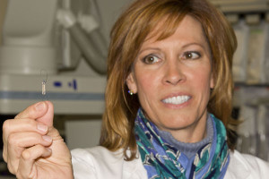 CVMC Heart Failure Specialist, Sara Paul, DNP, FNP holds the Cardiomems device which is approximately the size of a large paper clip.
